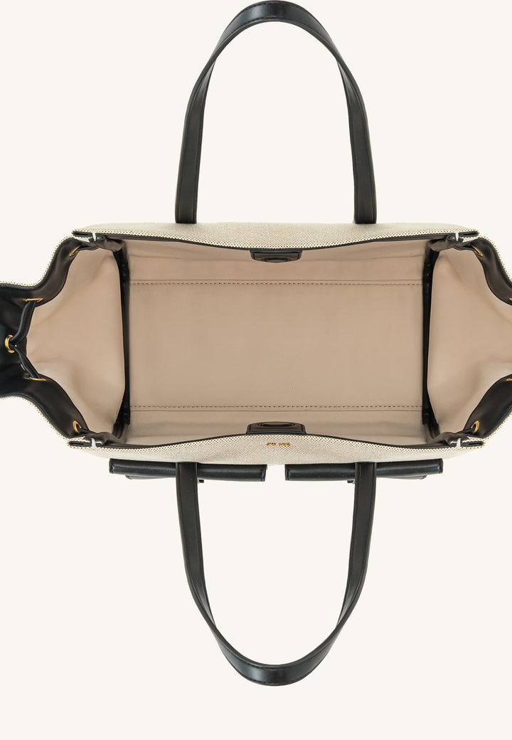 Cabas JW PEI Linda Black Canvas vu de dessus, intérieur beige, anses noires