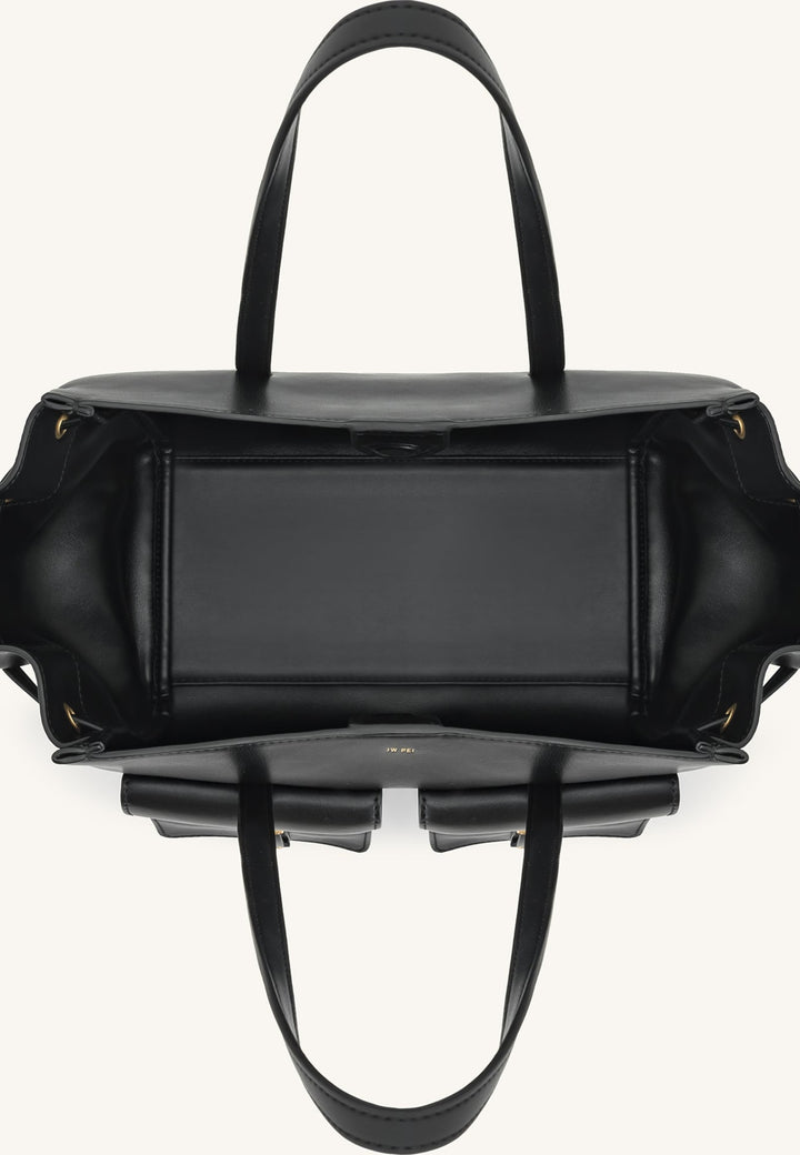 Vue intérieure supérieure du cabas JW PEI Linda noir, montrant le compartiment principal et les poches extérieures.