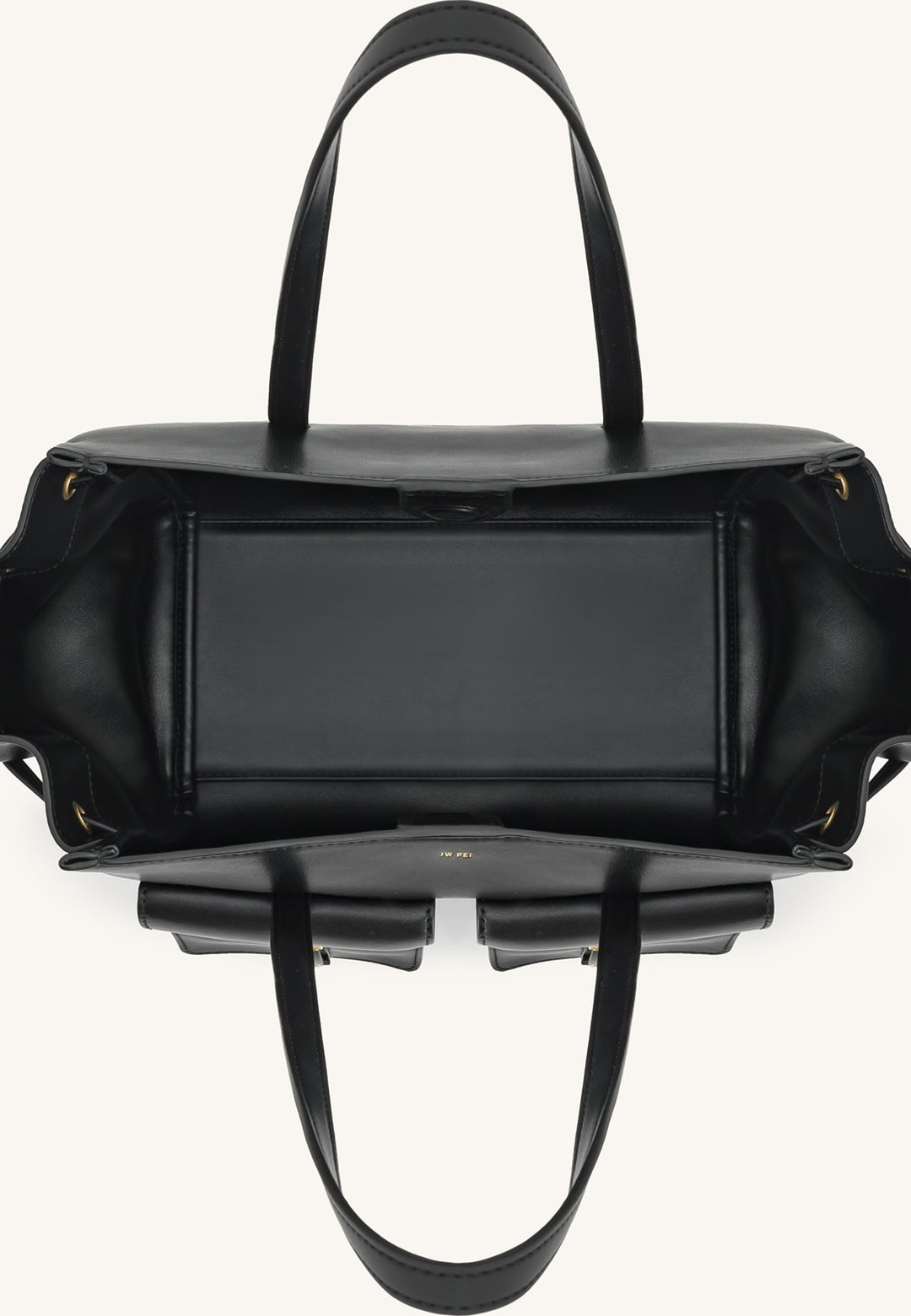 Vue intérieure supérieure du cabas JW PEI Linda noir, montrant le compartiment principal et les poches extérieures.