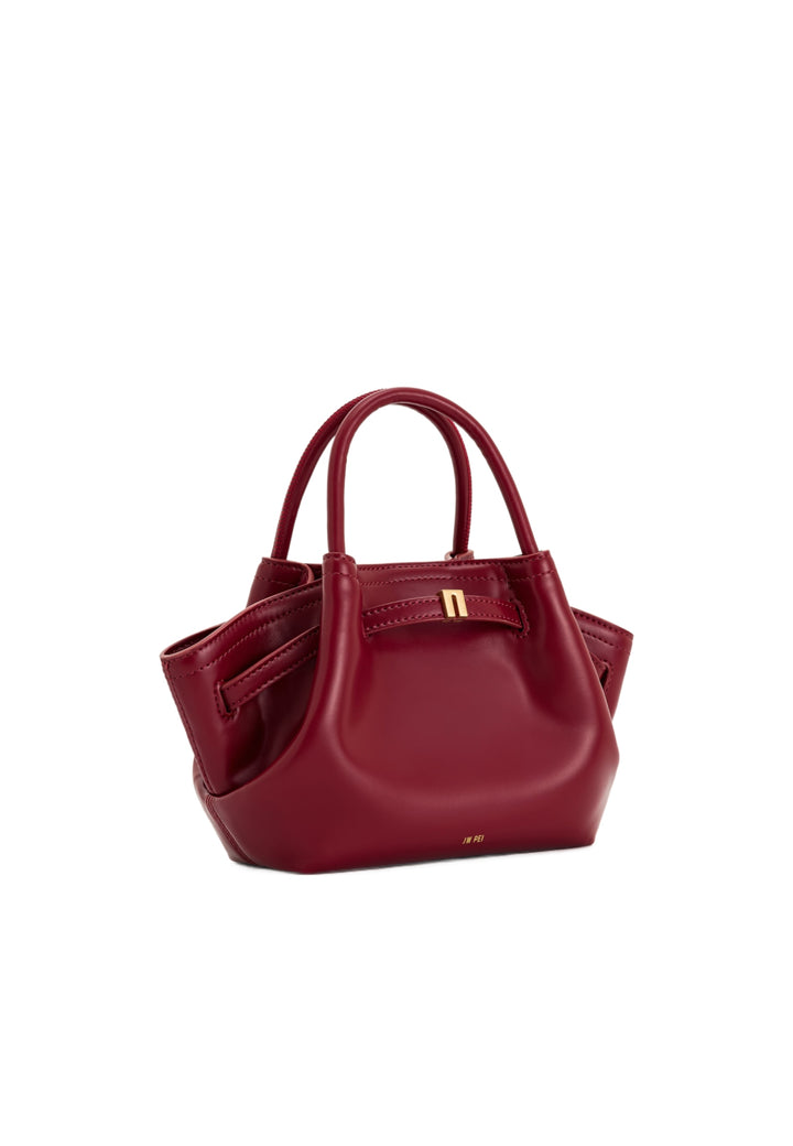 Cabas JW PEI Hana Claret en simili cuir, porté main, avec fermeture magnétique dorée.