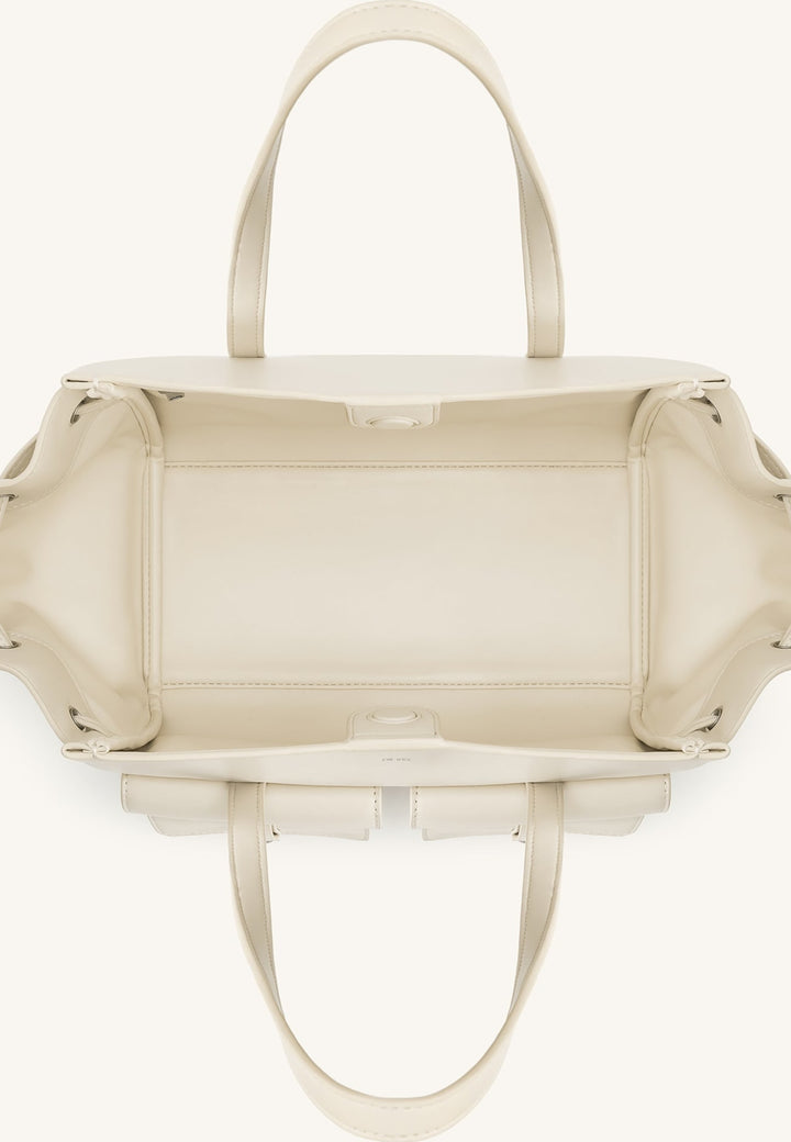 Intérieur d'un sac cabas JW PEI Linda blanc, vue de dessus, avec poignées et fermeture à clips