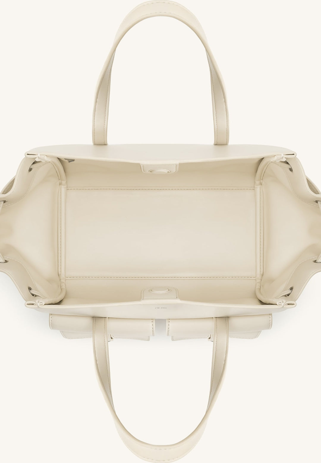 Intérieur d'un sac cabas JW PEI Linda blanc, vue de dessus, avec poignées et fermeture à clips