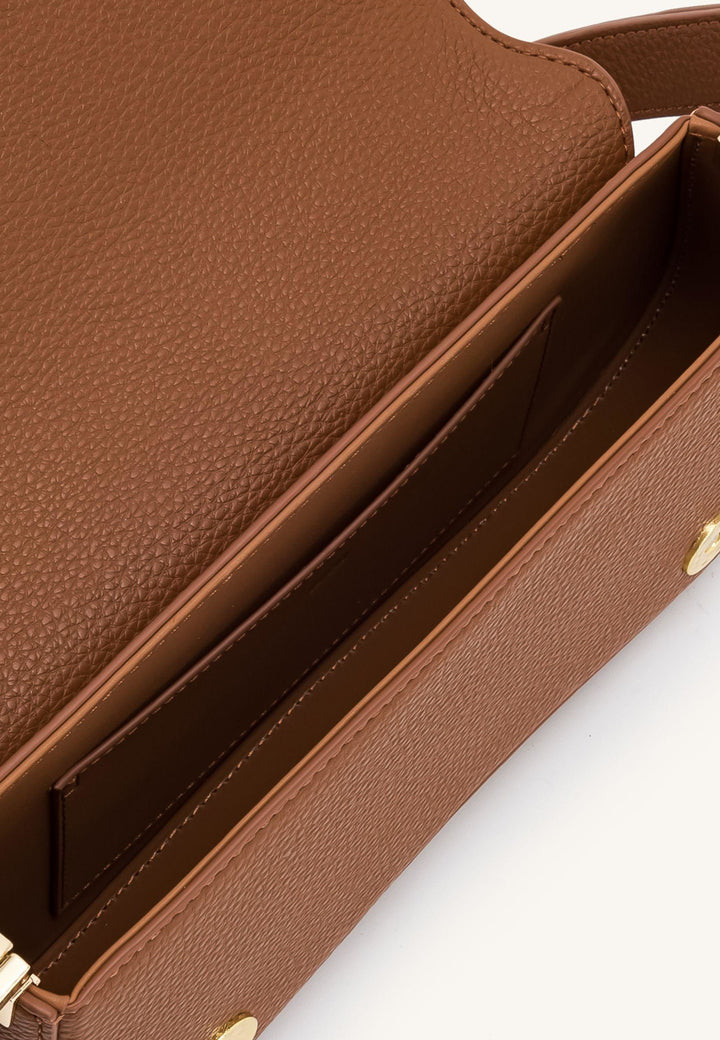 Intérieur d'un sac bandoulière JW PEI Joy Glazed Turmeric Brown en simili cuir texturé marron