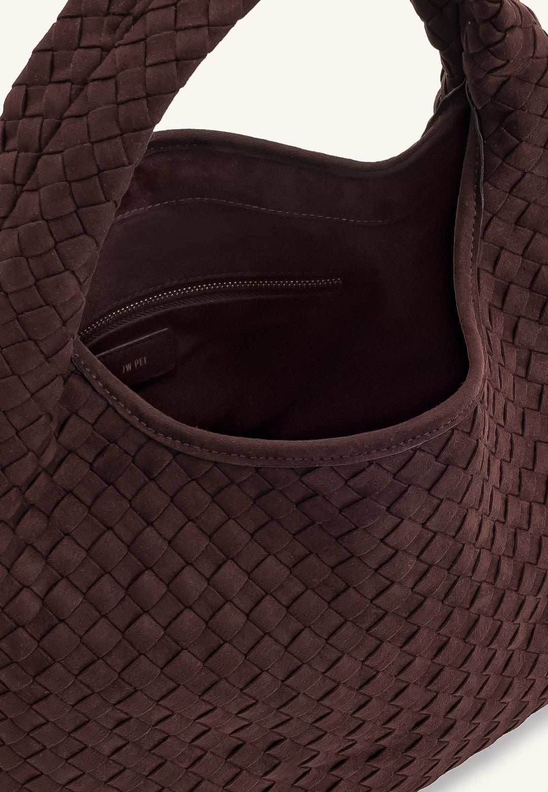 Intérieur du sac bandoulière JW PEI Laura Dark Brown avec fermeture éclair et étiquette de marque
