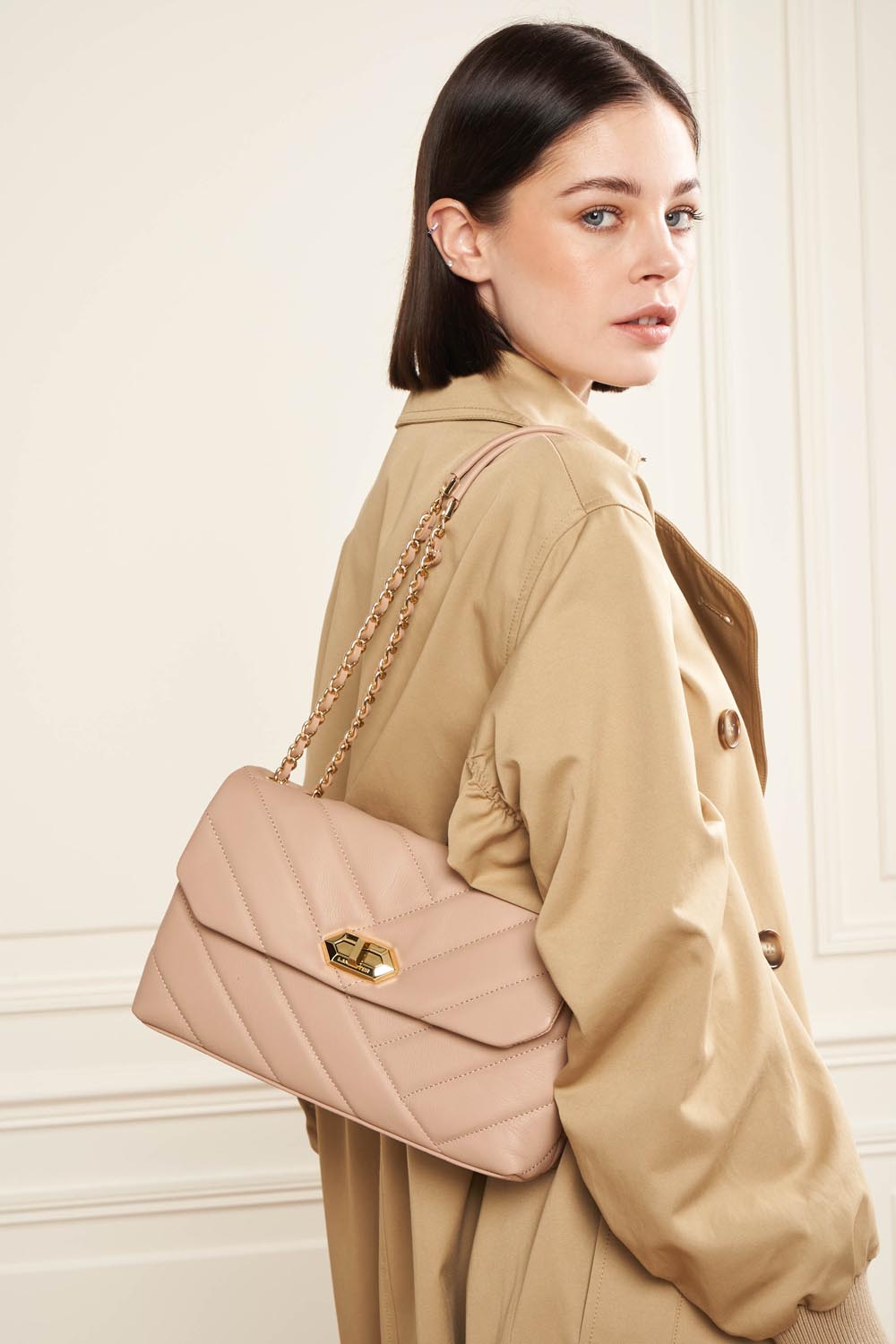 Lancaster Quilted Trotteur Bag Gold – worn